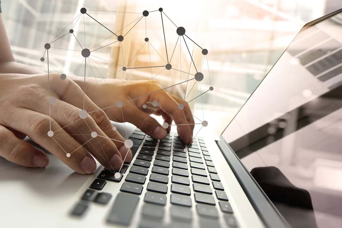 Double exposure of business man hand working on blank screen laptop computer on wooden desk as concept with social media diagram